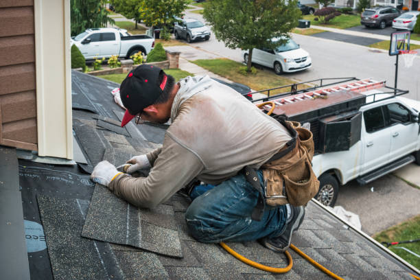 Professional Roof Replacement technician working in Dallas Center, IA